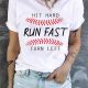 Baseball Print White Tee with "Hit Hard Run Fast Turn Left" Design